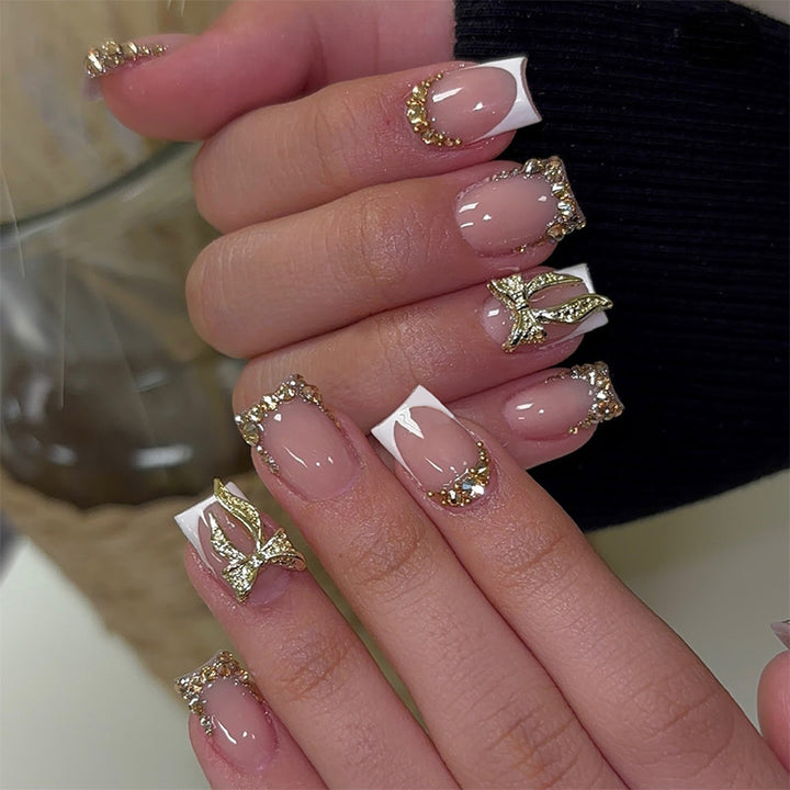 Artificial nail set with elegant glitter and flower decorations Bowlift