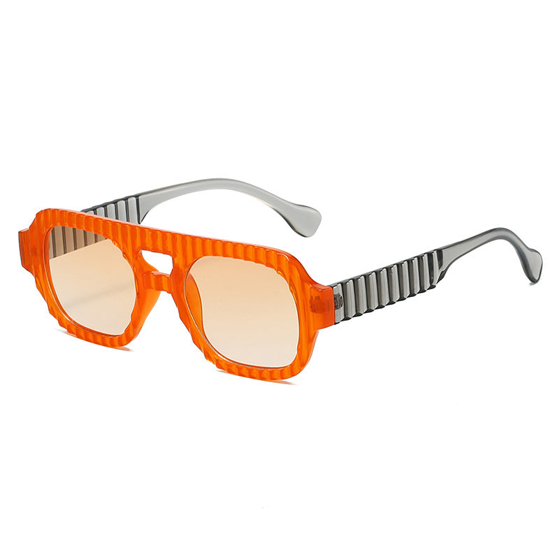 Ladies fashionable sunglasses in futuristic design with textured frame Bowlift