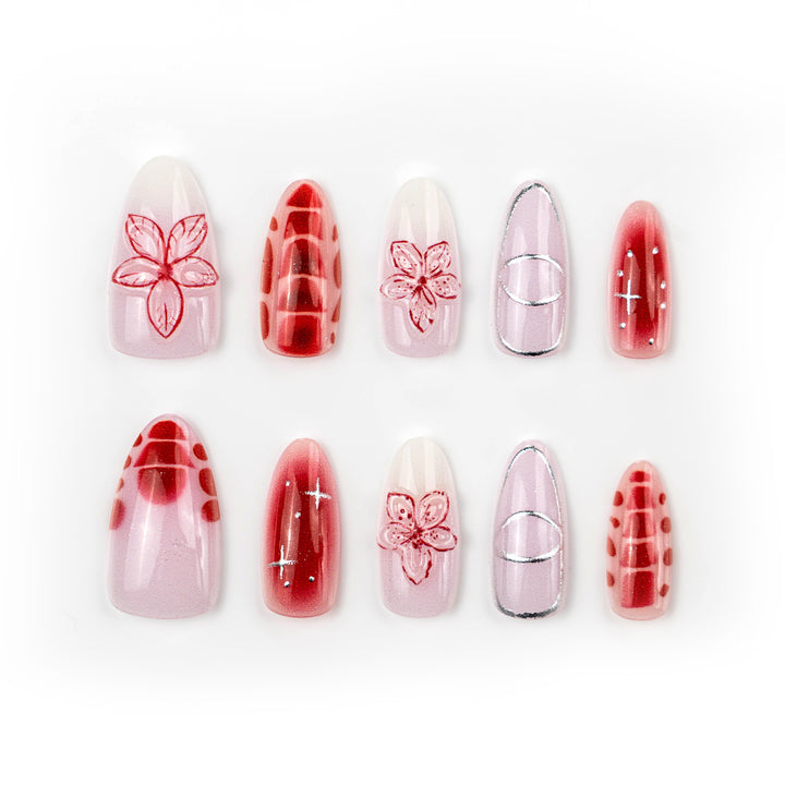 Artificial nails with floral accents and modern patterns Bowlift