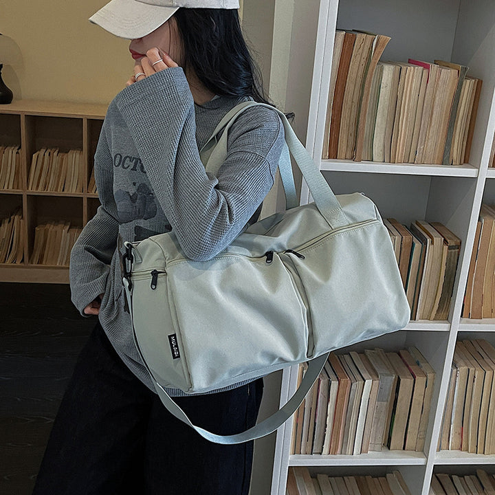 Sporty travel bag with expandable compartments Bowlift