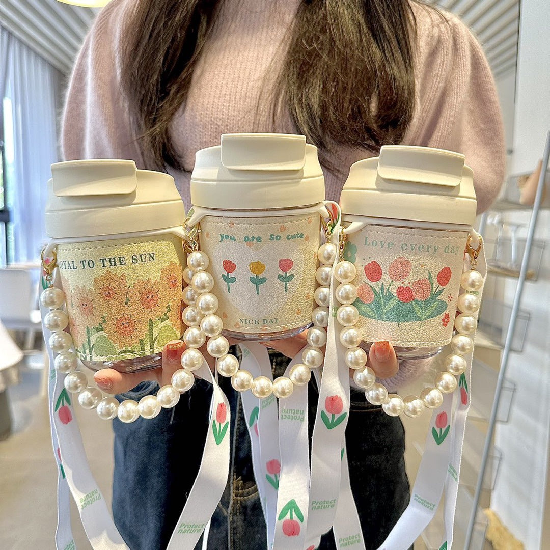 Women's insulated bottle with practical pearl carrying strap Bowlift