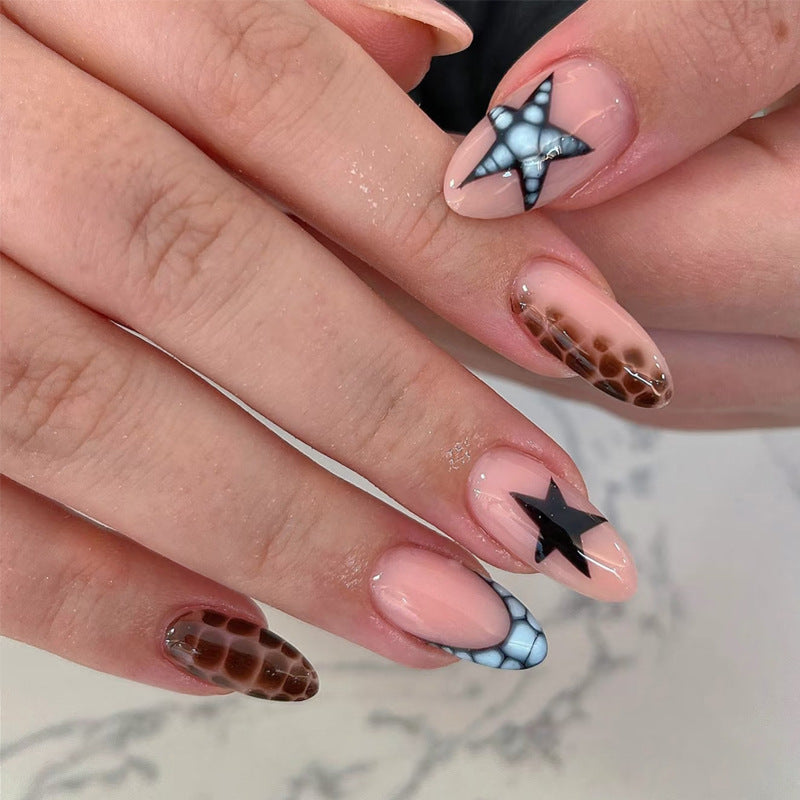 Artistic Press-On Nail Set with Unique Star and Texture Designs Bowlift