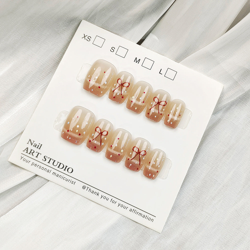 Artificial nail tips with shimmering design Bowlift