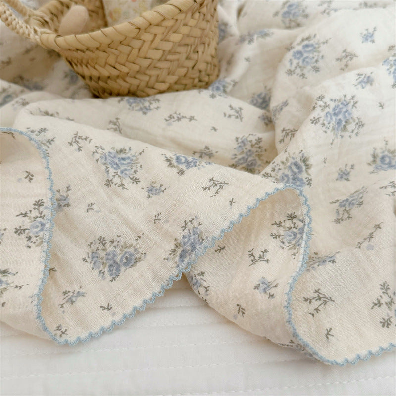 Unisex Muslin Blanket with delicate floral design and elegant ruffles Bowlift