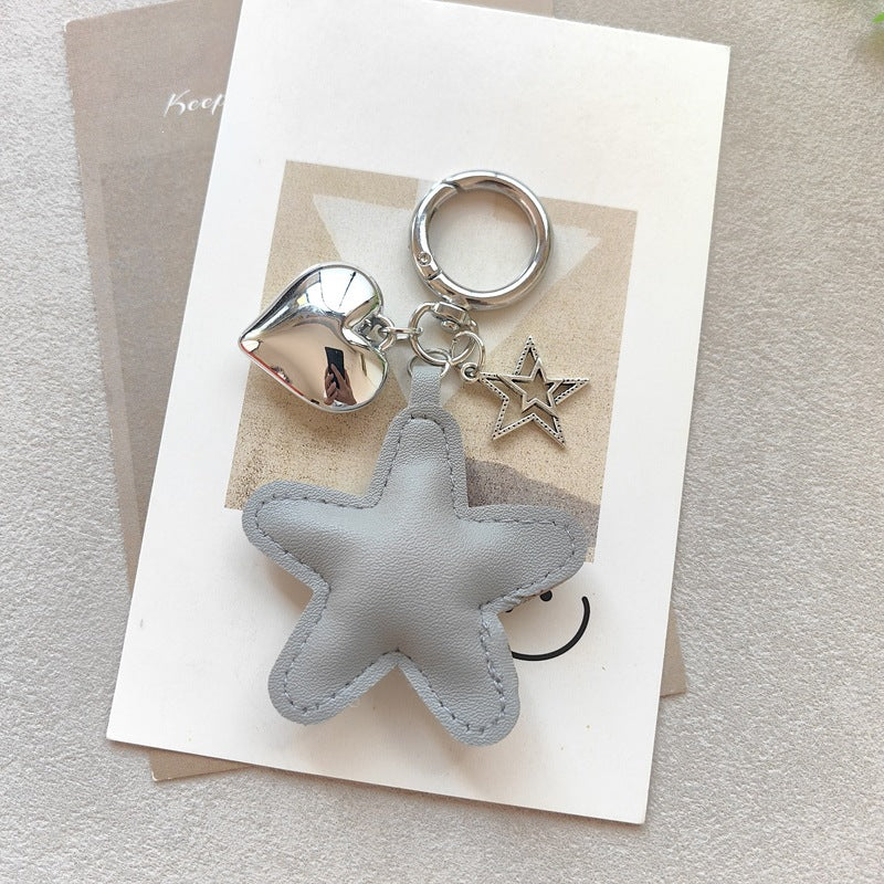 Keychain with star and heart design Bowlift