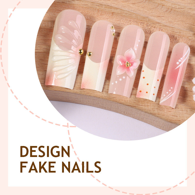 Artificial nail set with delicate flower and glitter accents Bowlift