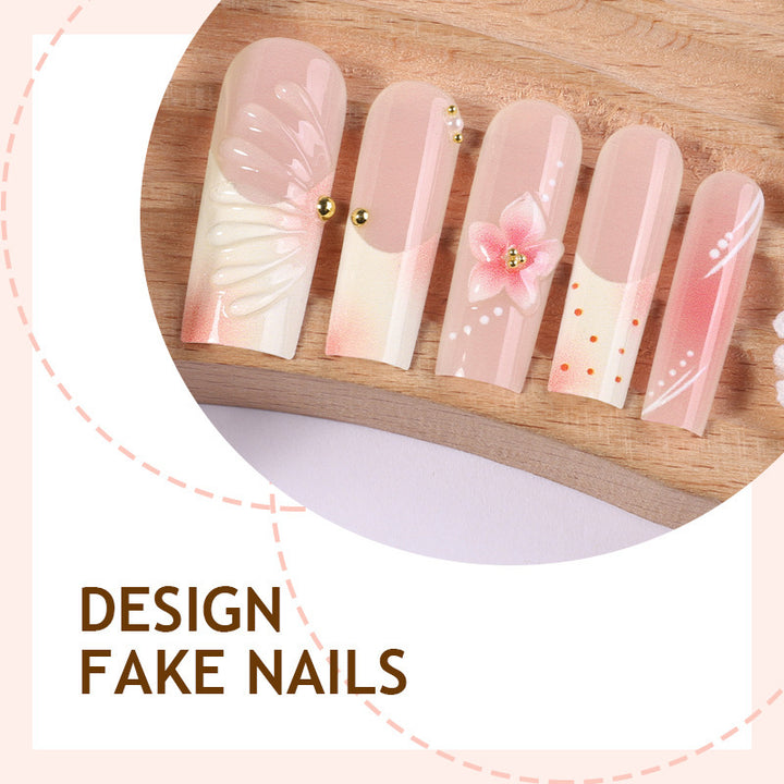 Artificial nail set with delicate flower and glitter accents Bowlift