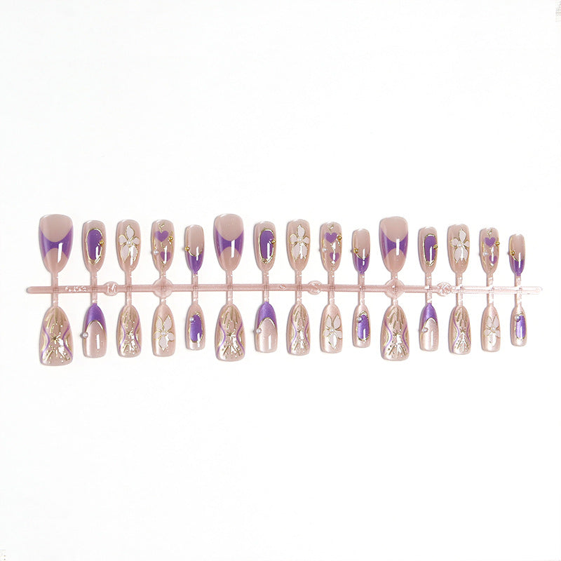 Artificial nail set with elegant flower and glitter details Bowlift