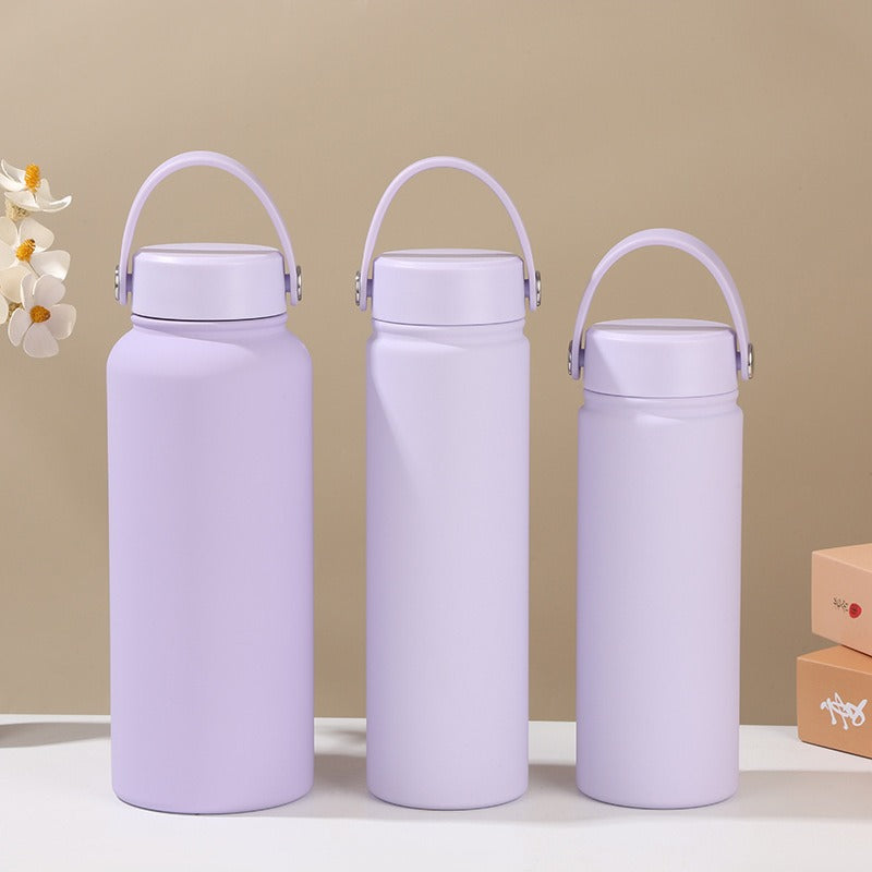 Women's insulated water bottle with ergonomic carrying handle Bowlift