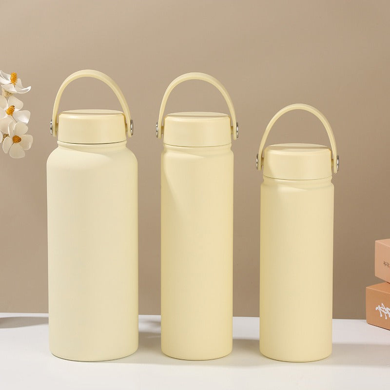 Women's insulated water bottle with ergonomic carrying handle Bowlift