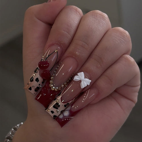 Artificial nail set with elegant flower and glitter effects Bowlift