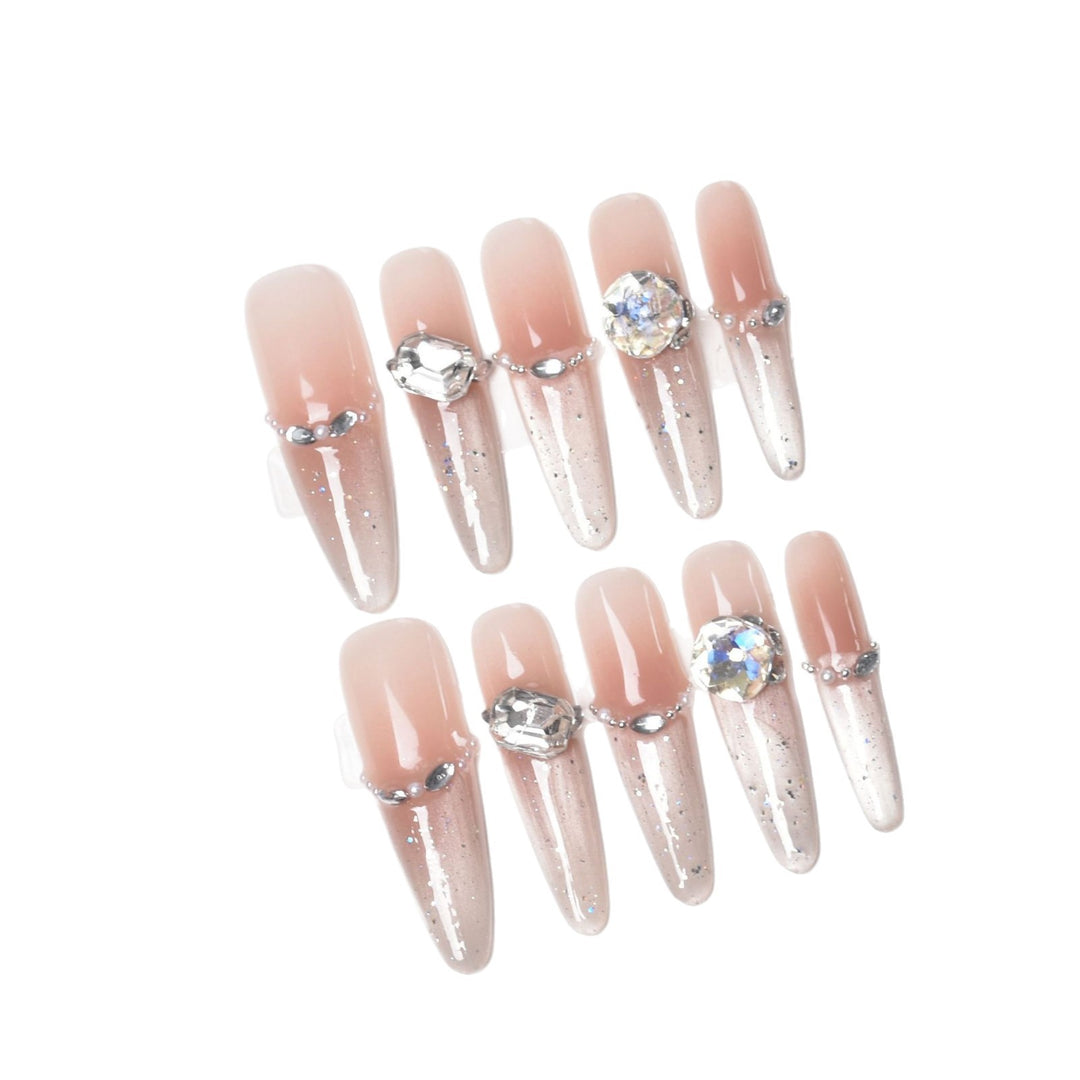 Artistic Stiletto Press-On Nail Art with Glimmering Accents Bowlift