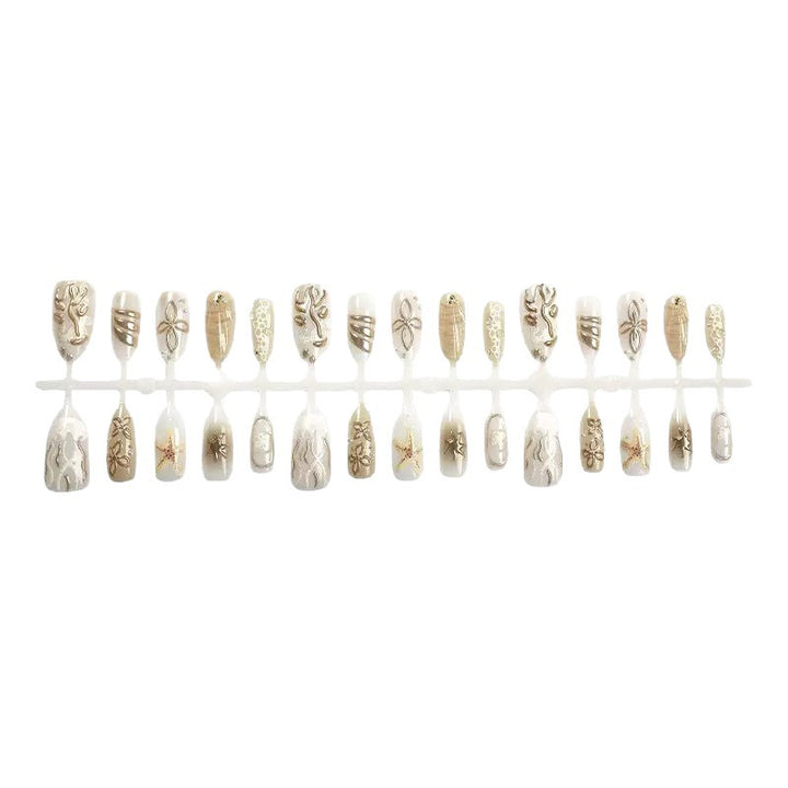 Elegant artificial nails with maritime motifs Bowlift