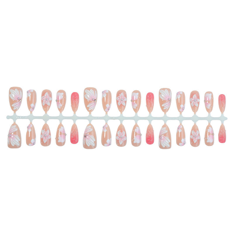 Artificial nail set with floral motifs and rhinestone decorations Bowlift