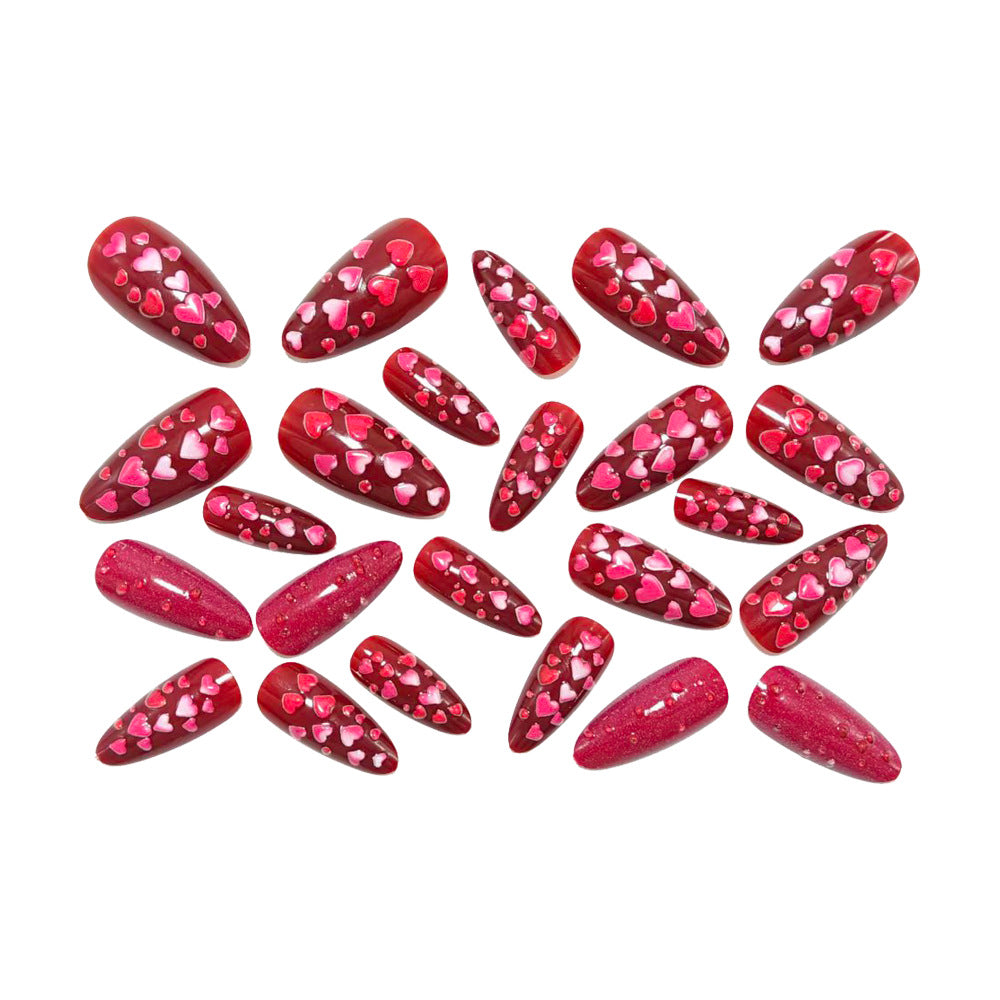 Artificial nails with heart motif and glitter effects Bowlift