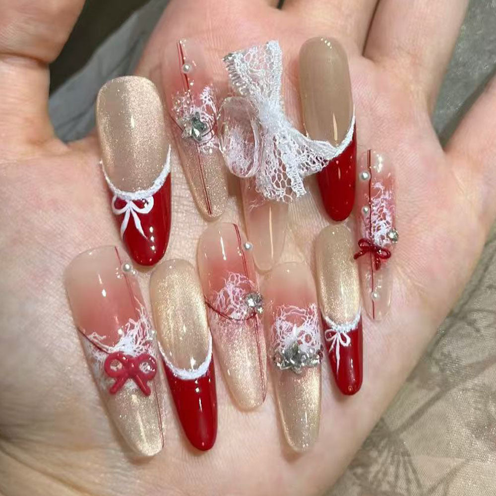 Artificial nails with romantic bow and lace design Bowlift