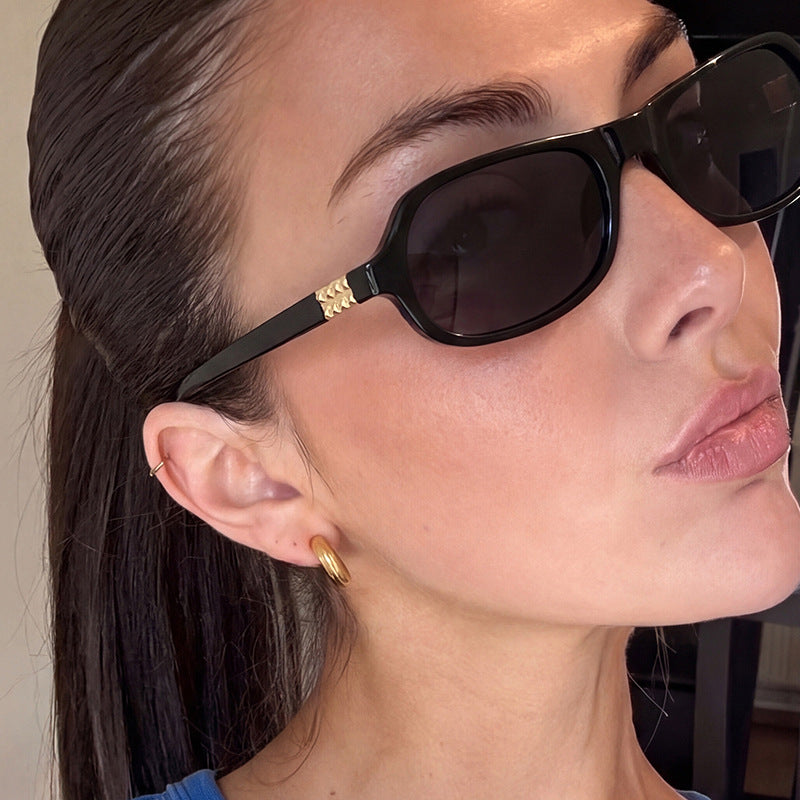 Ladies stylish fashionable sunglasses with golden accents Bowlift