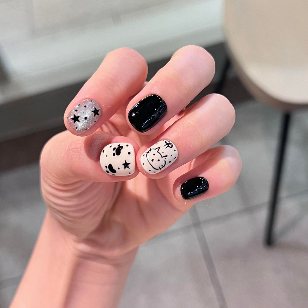 Artificial nails with cat and star design Bowlift
