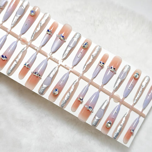 Artificial nails with elegant glitter design and fine 3D decorations Bowlift
