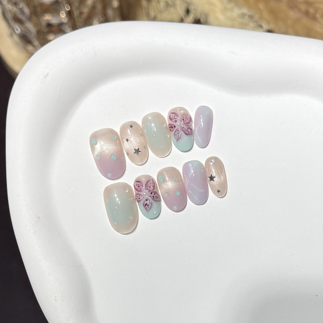Floral-Inspired Press-On Nail Art Set with Star Accents Bowlift