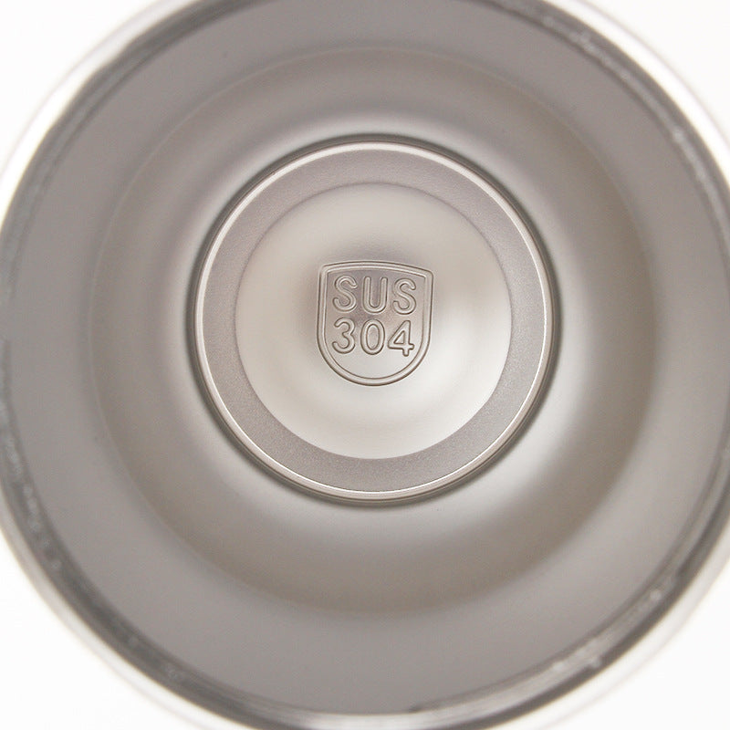Women's drinking cup with vacuum insulation and practical lid Bowlift