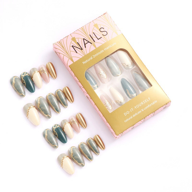 Artificial nails with elegant golden accents Bowlift