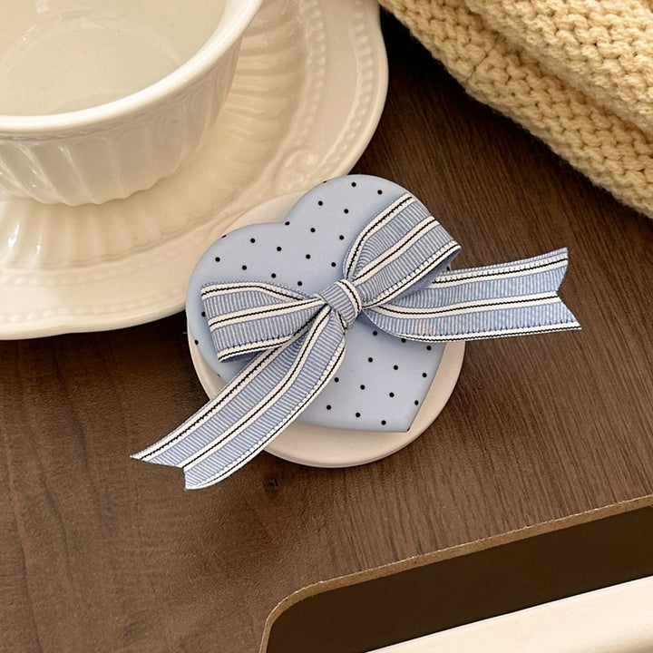 Heart-shaped cosmetic box with bow motif Bowlift