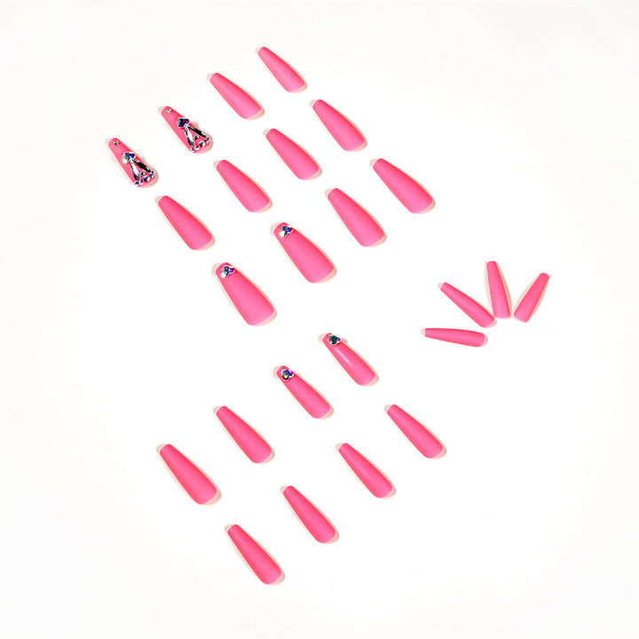 Artful nail art with glitter and heart accents Bowlift