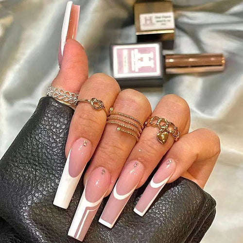 Artificial nails with elegant geometric designs and glossy finish Bowlift