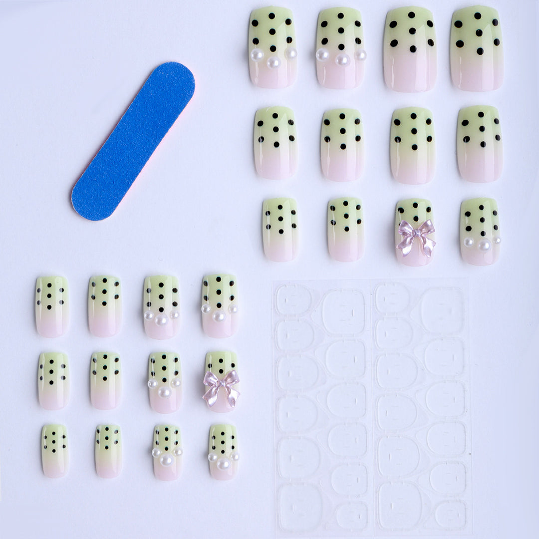 Artificial nails with playful dots and 3D elements Bowlift