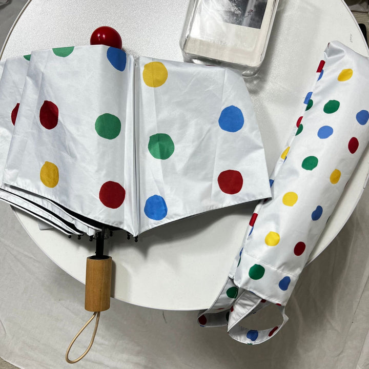 Ladies designer foldable umbrella with colorful polka dot pattern Bowlift