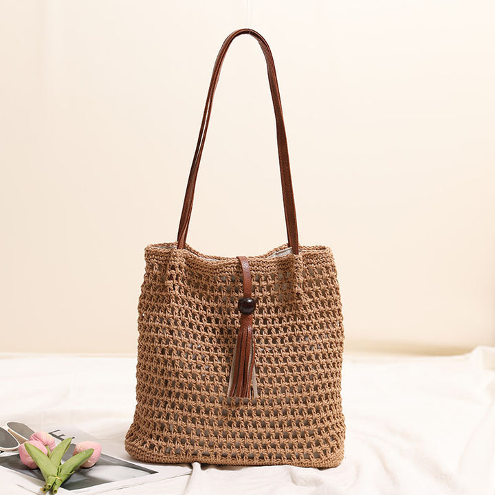 Hand-knotted basket bag with elegant leather handles Bowlift