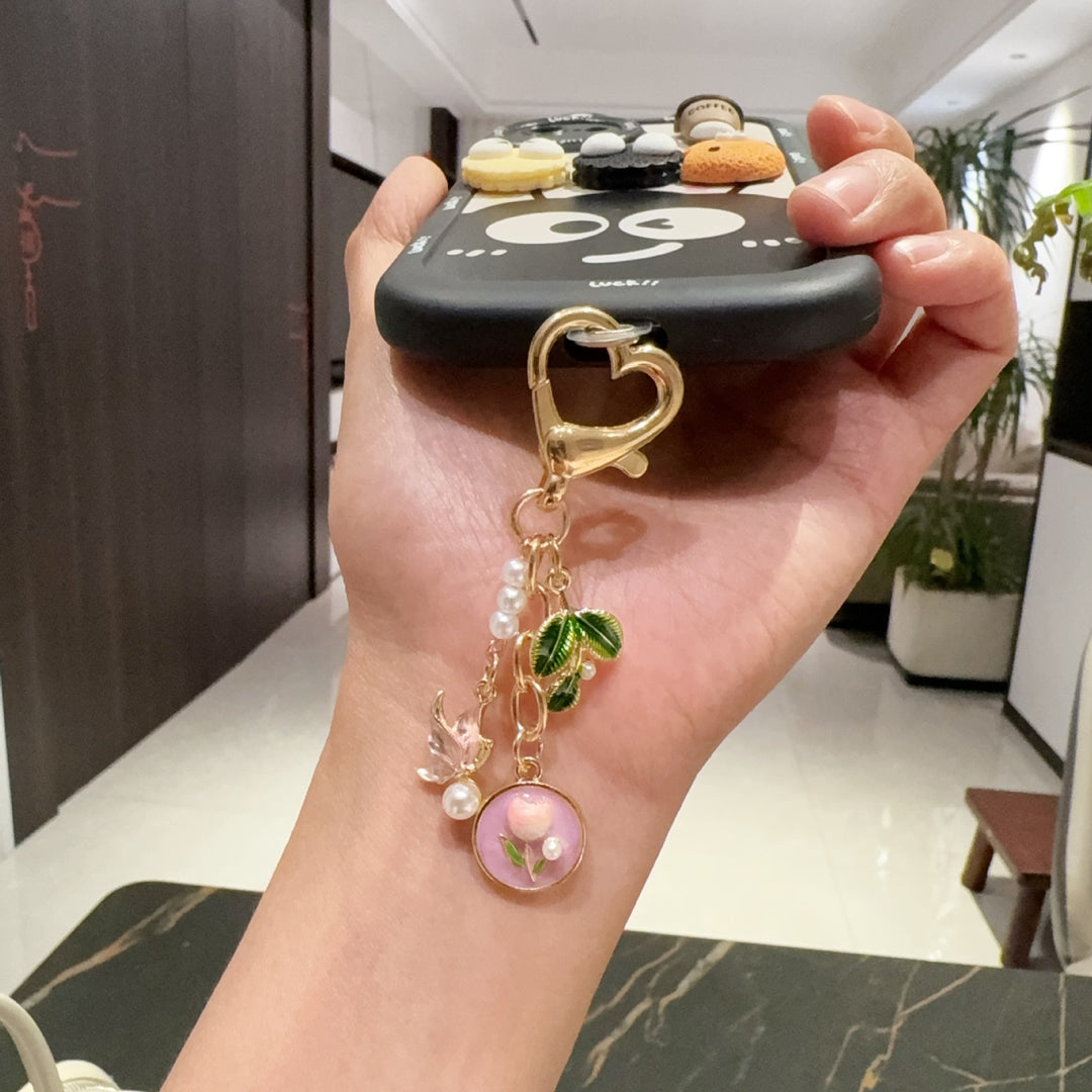 Playful keychain in rose design Bowlift