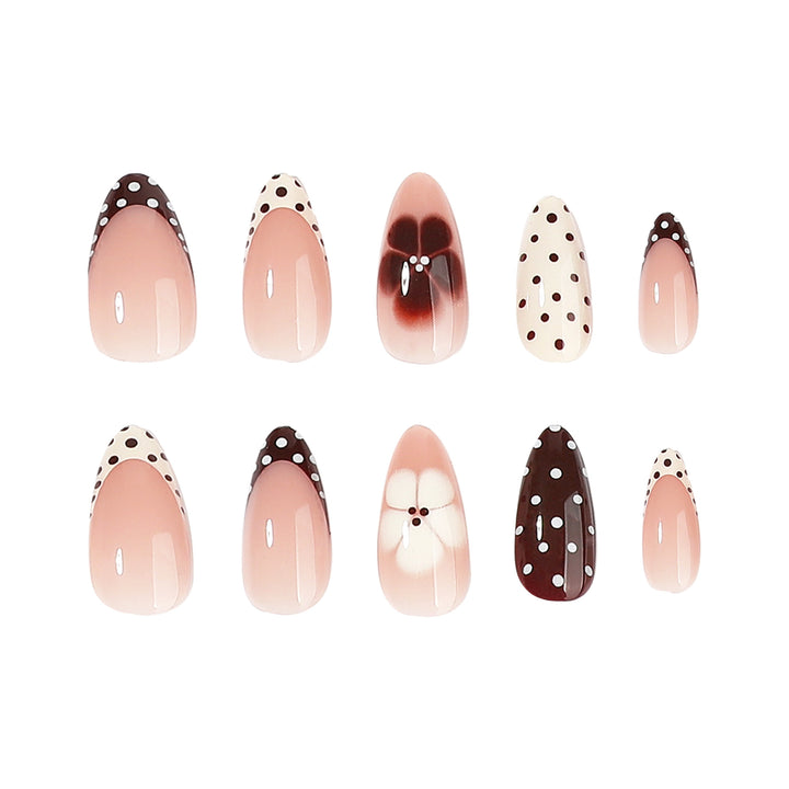 Artful nail art with floral design and various patterns Bowlift