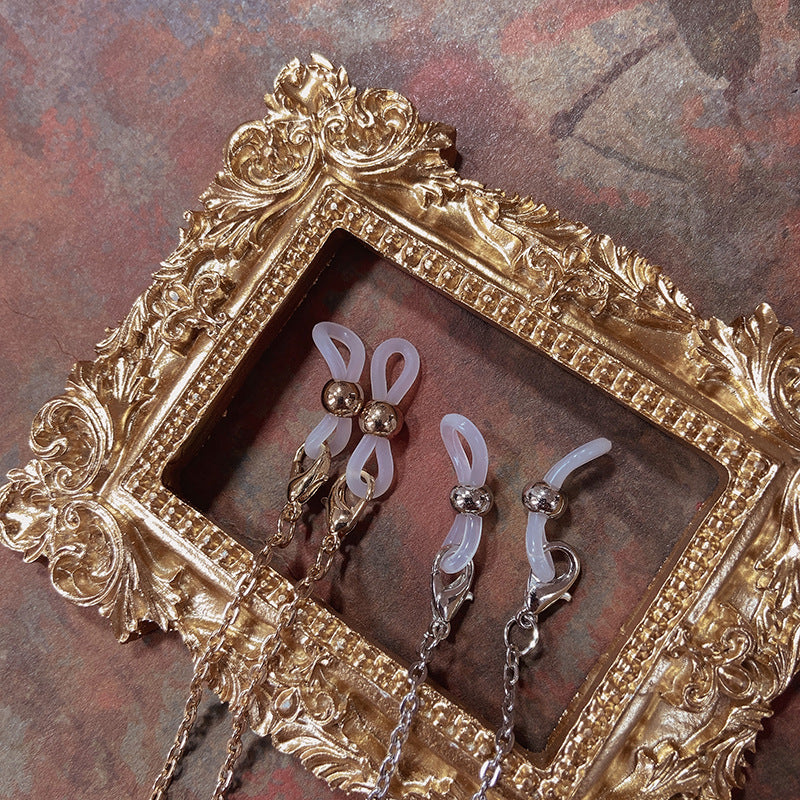 Elegant jewelry holder chain with red accents Bowlift