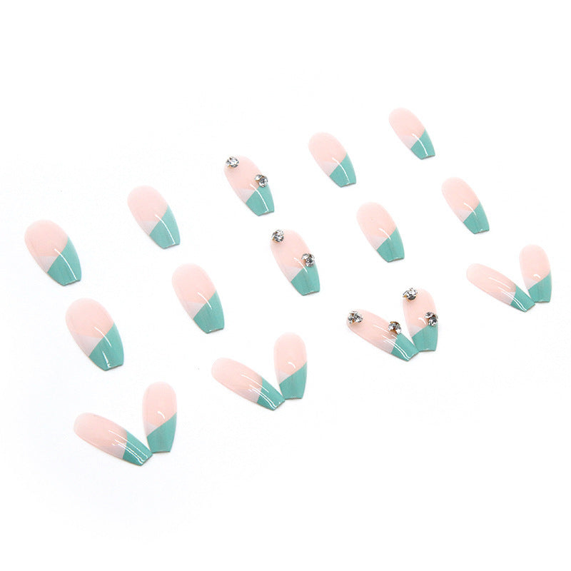 Artificial nail tips with glitter accents and elegant design Bowlift