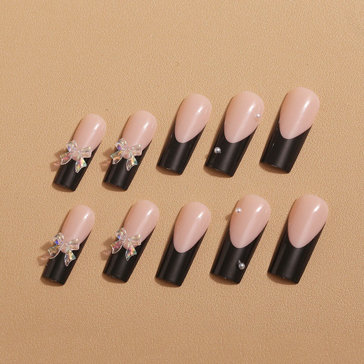 Nail decoration with elegant bows and rhinestones Bowlift