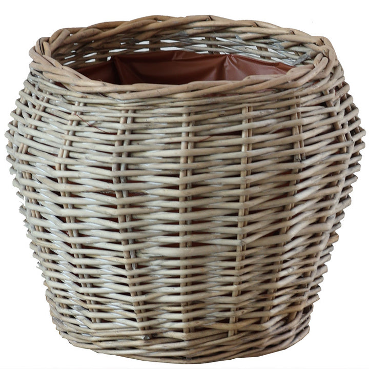 Stylish laundry basket made of braided natural material Bowlift
