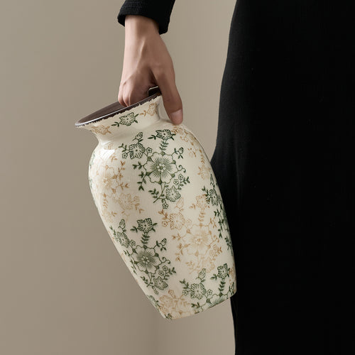Decorative porcelain vase with floral design Bowlift