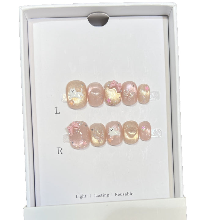 Whimsical Press-On Nail Art Set with Playful Character Designs Bowlift