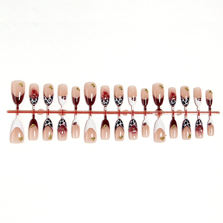 Artificial nail set with elegant floral patterns and glamorous details Bowlift