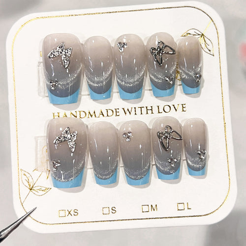 Artificial nail art with modern accents Bowlift