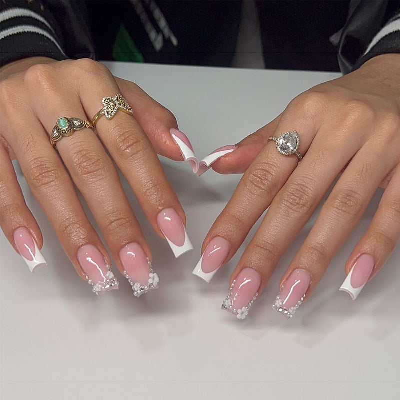 Press-On Nail Set with French Tip Design and Floral Accents Bowlift