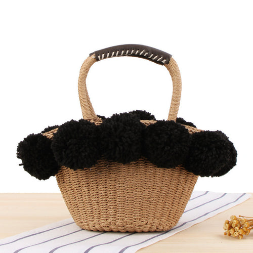 Basket bag with pompom decorated top edge Bowlift