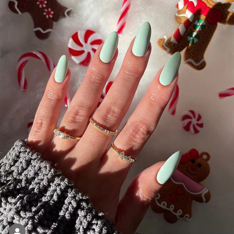 Artful nail designs with a matte finish and elegant stiletto shape Bowlift