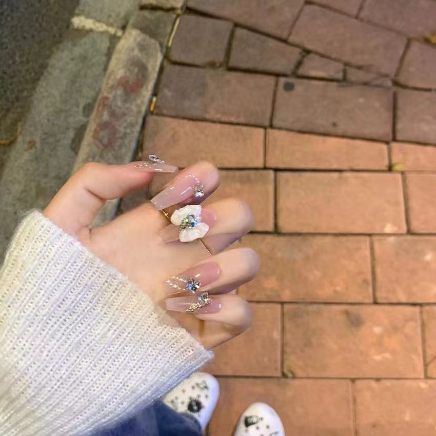 Elegant artificial nails with floral decor and glitter Bowlift