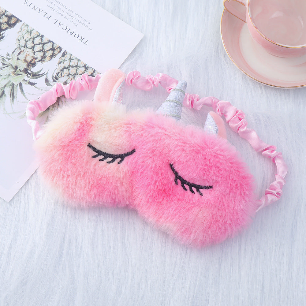 Women's plush-filled unicorn sleep mask with 3D horn, embroidered eyelashes and adjustable satin band Bowlift