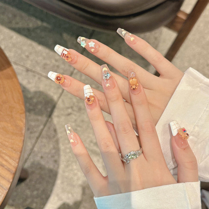 Artificial nail set with charming animal design and sparkling crystal embellishments Bowlift