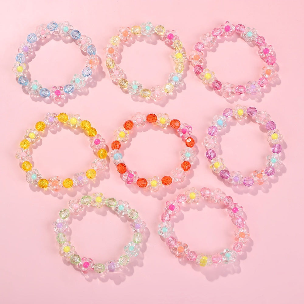 Friendship bracelet with colorful flower motifs Bowlift