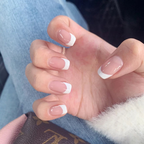 Artificial nails in French Tip design Bowlift